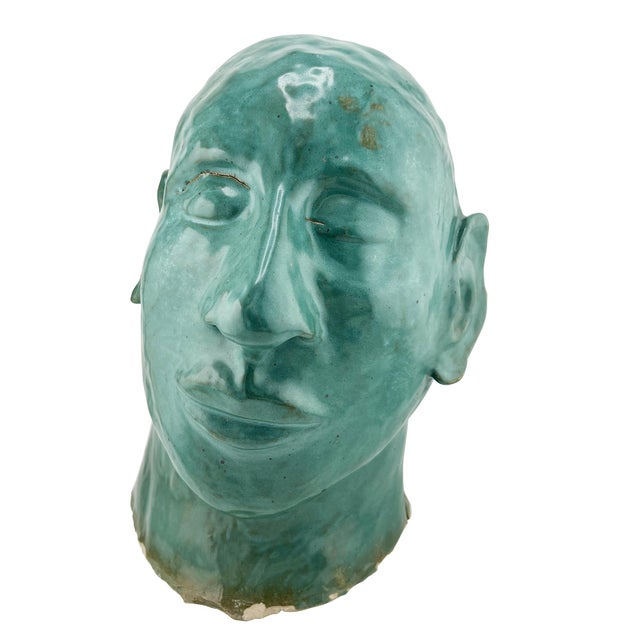 This hand-sculpted ceramic bust is a striking example of Southwestern studio art, finished in a rich verde blue green...
