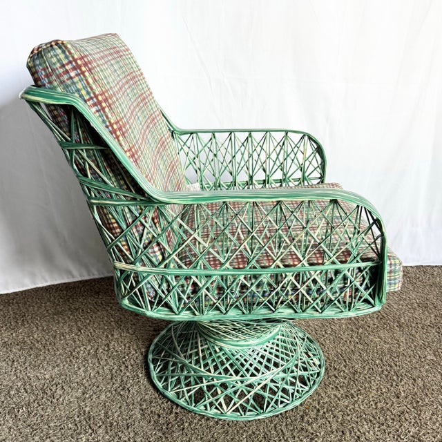 A whimsical gem from the atomic era, this Mid-Century spun fiberglass lounge chair boasts a sculptural lattice frame in...