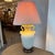 Design Plus Gallery presents a Classic Amphora Ceramic Table Lamp. This table lamp has a glossy cream ceramic urn body...