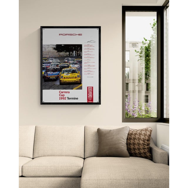 The Piece This original 1992 Porsche Carrera Cup schedule poster highlights the prestigious motorsport series. Designed by...