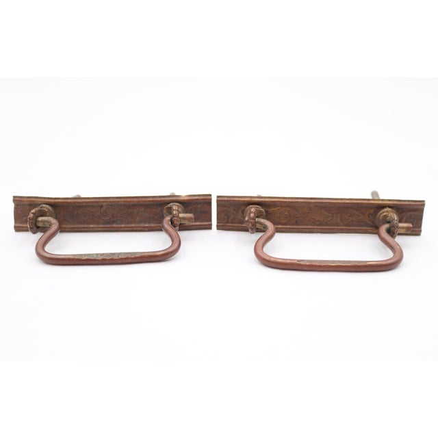 Victorian style bail drawer pulls made of pressed brass with an antique finish. The original mounting nuts are not...