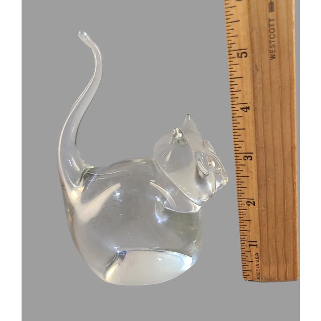 This vintage art glass crystal paperweight features a beautifully crafted cat figurine. The clear crystal material and...