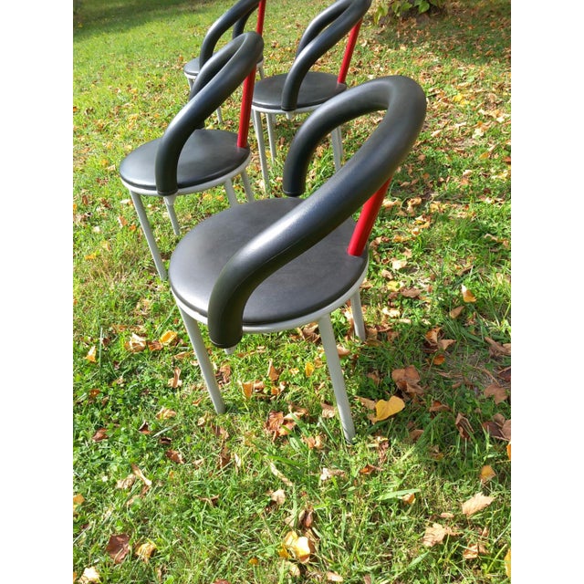 This set of Alpha chairs was designed in 1985 by Anna Anselmi for Bieffeplast of Padua. The structure is in tubular steel...