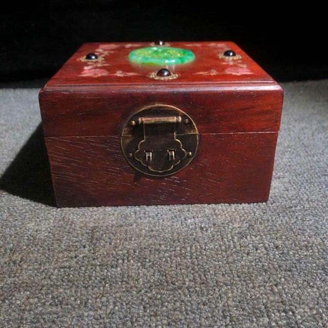 A stunning vintage Chinese hardwood jewelry box, crafted from deep reddish-brown Huali (Rosewood) with beautiful natural...
