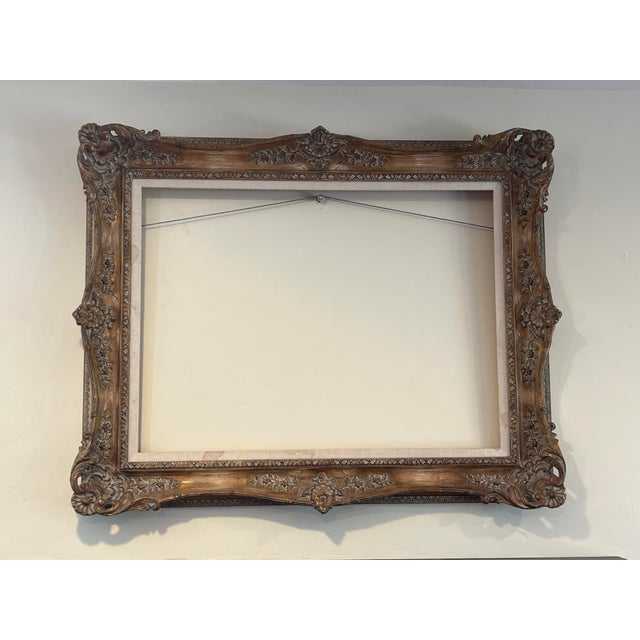 An exquisite antique picture frame, originally commissioned and custom-framed in Paris, France in September 1977. This...