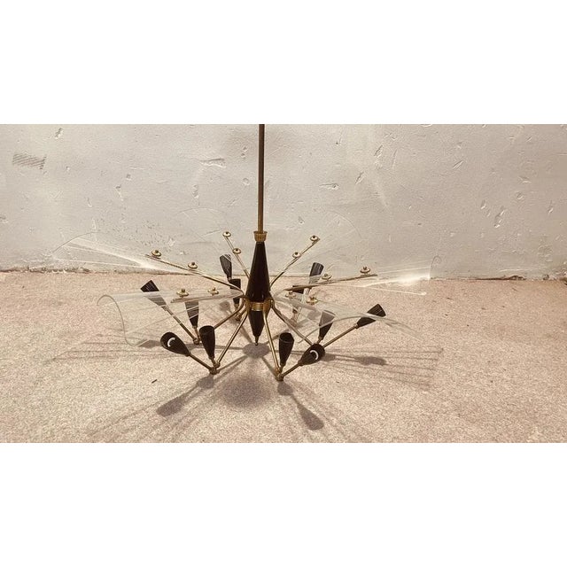 Stilnovo chandelier, 50s, each arm uses two light points that reflect on molated crystals. The crystals are perfect. I...