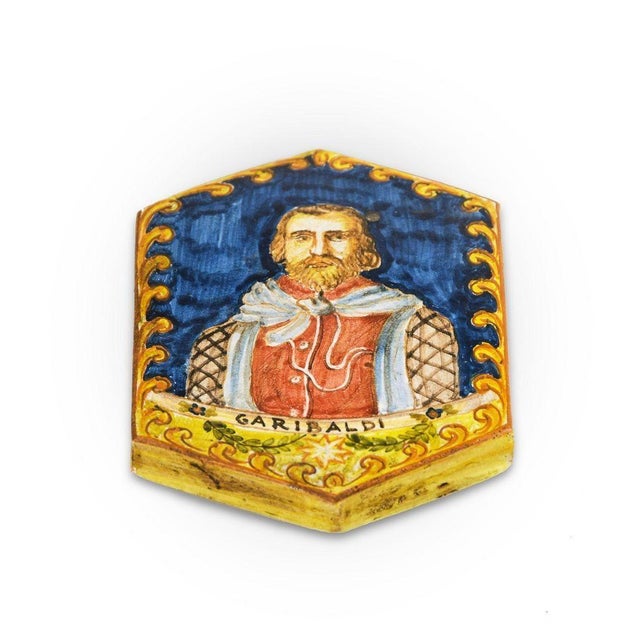 This Garibaldi's Portrait Majolica is an original decorative object realized in ceramic. An interesting colored ceramic...