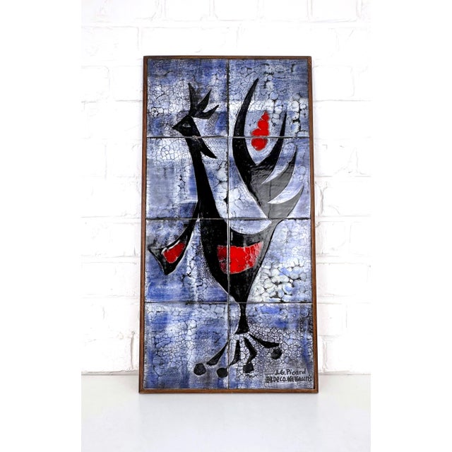 Signed ceramic wall panel by j.g. Picard, vallauris, france, circa 1960s. the composition consists of eight individually...