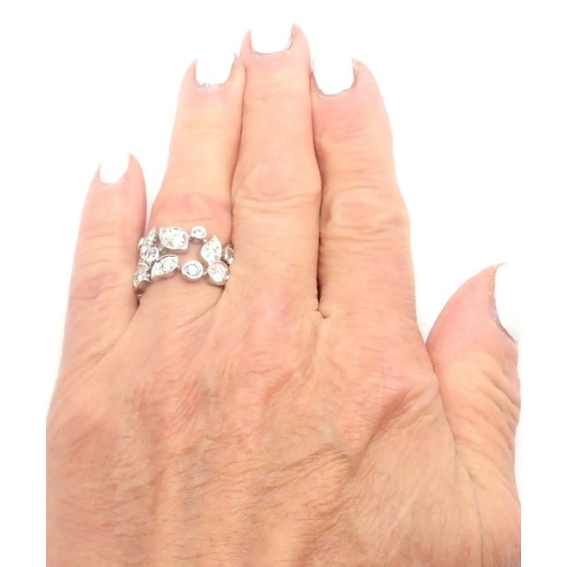 18k White Gold Diamond Leaf Wide Band Ring by Cartier. Details: Ring Size: European 53, US 6 1/4 Weight: 10.4 grams Width:...