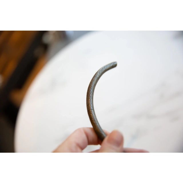 African Vintage African Bronze Artifact With Geometric Detailing For Sale - Image 3 of 9