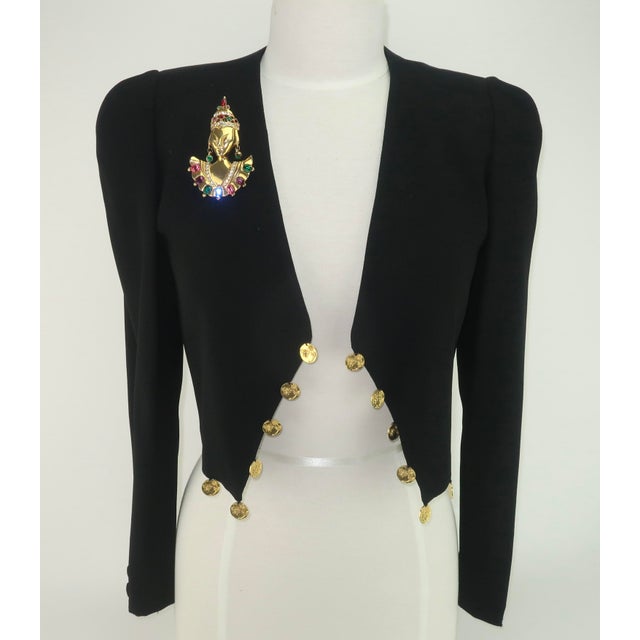 1940's Reinad novelty gilt gold brooch in the form of an Asian Princess colorfully bejeweled with faceted rhinestones in...