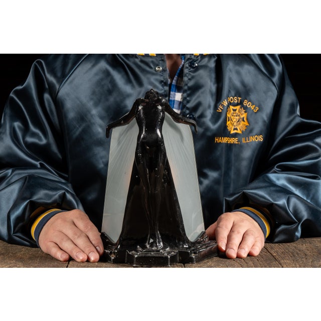 c. 1980s; Sarsaparilla Deco Designs - New York, NY Cast-metal figural table lamp depicting a stylized nude female form...