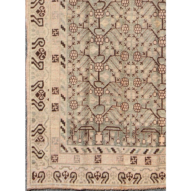 Measures: 5'8 x 11. Antique Khotan Rug Featuring Repeating Lattice Motif in Soft Gray, Warm Beige. Keivan Woven Arts / rug...