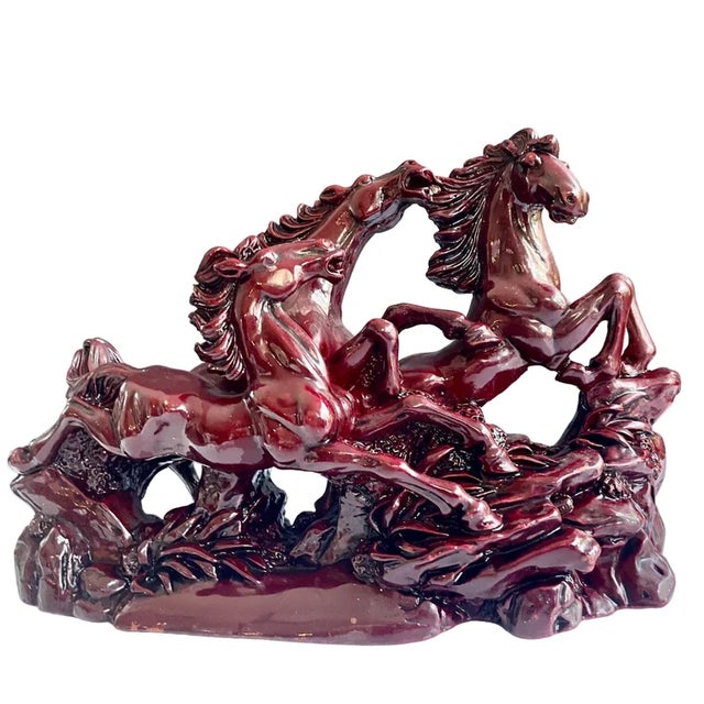 Elevate your space with this commanding vintage Feng Shui sculpture, featuring three wild stallions in full...