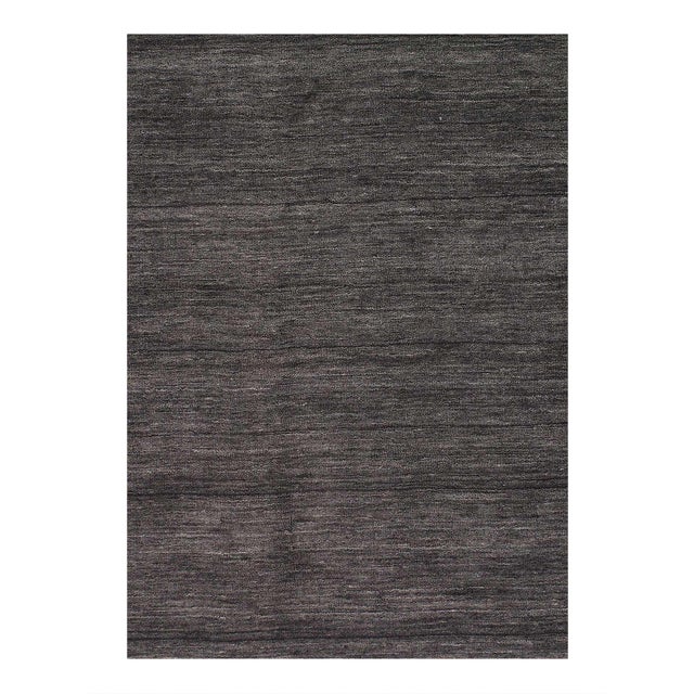 Gabbeh rugs are made by the nomadic Qashqai tribes . They are rough cut and long piled rugs of rich color and best quality...