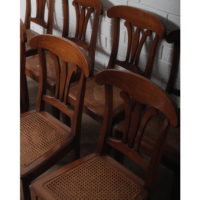 Late 20th Century Set of Eight Neoclassical Style Cherry Dining Chairs With Cane Seats and Saber Legs For Sale - Image 4 of 7