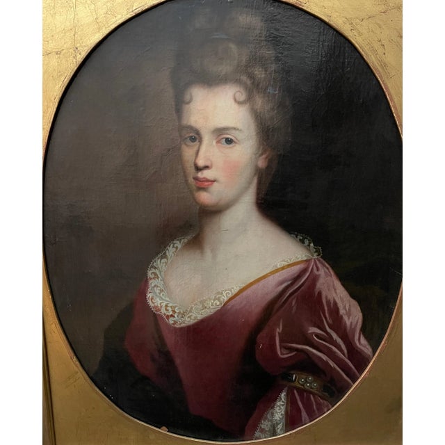 18th century continental portrait of a young lady, unsigned. Oil on canvas, oval painting and stretcher set in rectangular...