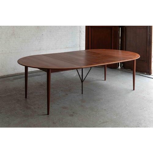 This dining table was designed by Grete Jalk and produced by Poul Jeppesen in Denmark in the 1960’s. It’s a versatile...
