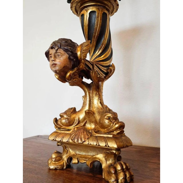 A fabulous French Empire period giltwood figural candlestick, early 19th century, now professionally electrified and...