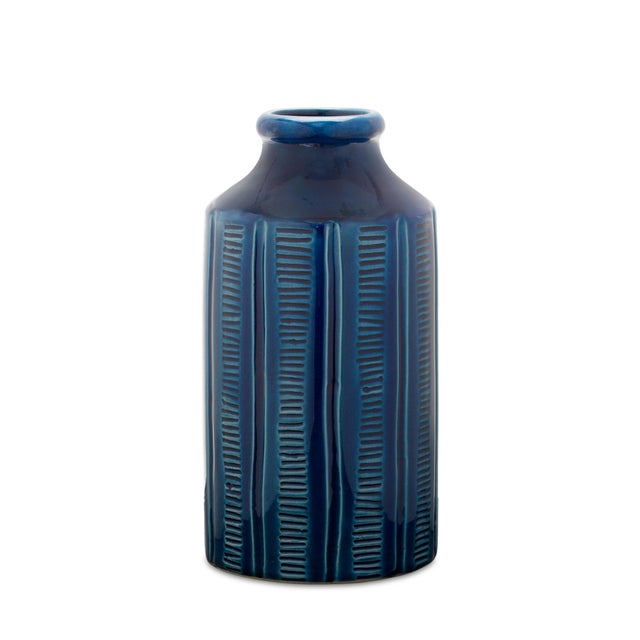 Transform any space with the timeless elegance of the Blue Etched Terra Cotta Vase. Featuring a cool, serene blue tone and...
