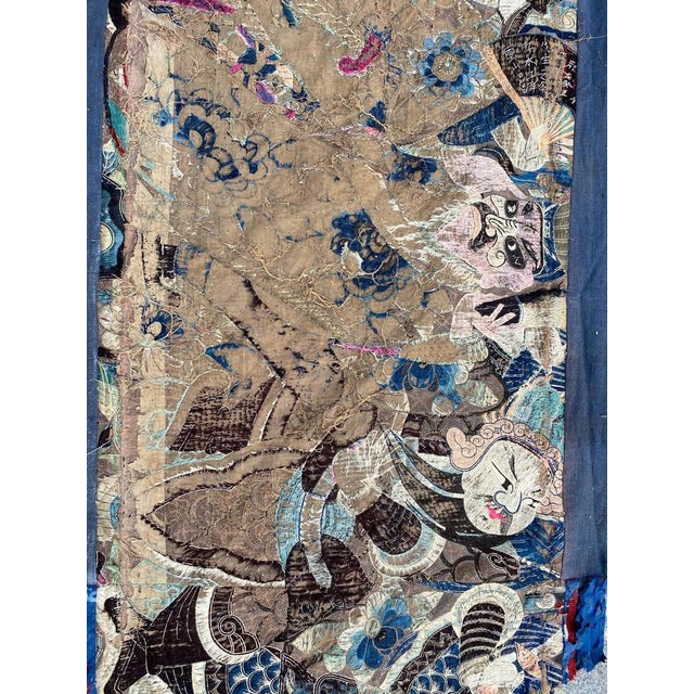 Distressed 19th century embroidery from China with a beautiful Chinese design and beautiful colors, entirely handwoven...