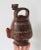 Vintage hand painted folk art Peruvian terracotta vessel pitcher with animal motif. Made in Peru. Some age wear to painted...