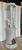 Imposing 19th century. Continental white faience glazed terra cotta stove in 5 parts. Great quality- the flue modeled as a...
