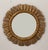 A beautiful French gilt sunburst (or starburst) mirror with gilded rays arranged around a mirror plate glass center....