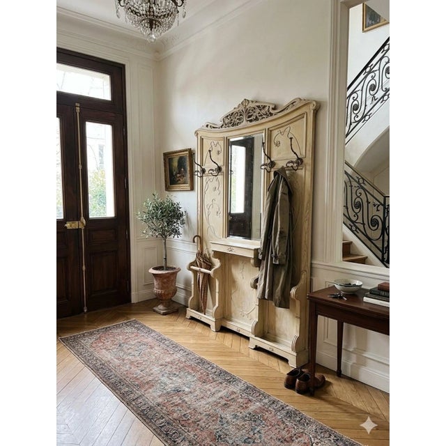 Parisian elegance is reflected in this Art Nouveau hall tree. Notable details of this style such as flowers and curving...