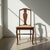 Elegant vintage Queen Anne side chair crafted in mahogany, reflecting the enduring influence of early 18th century English...
