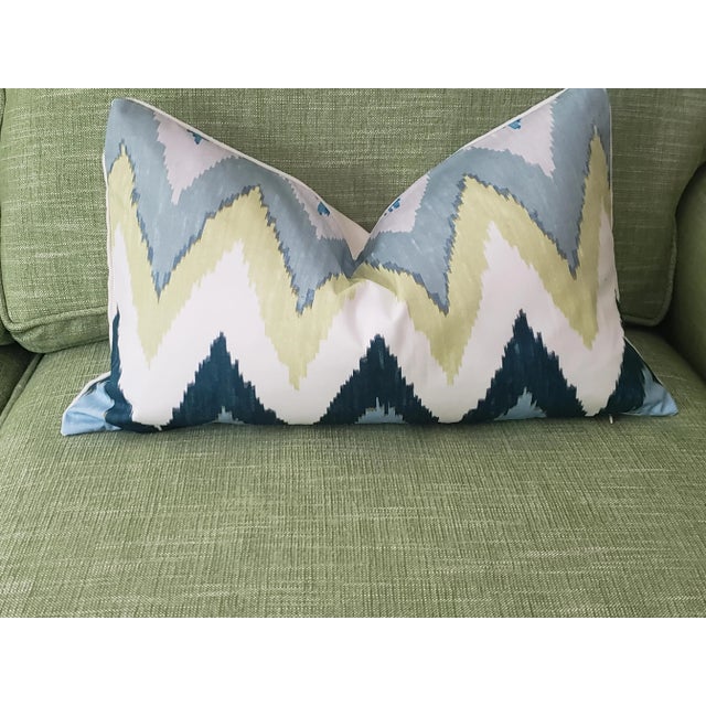 This 12" x 20" pillow features F. Schumacher's Adras ikat fabric, in the sky colorway. Pillow cover is constructed with a...