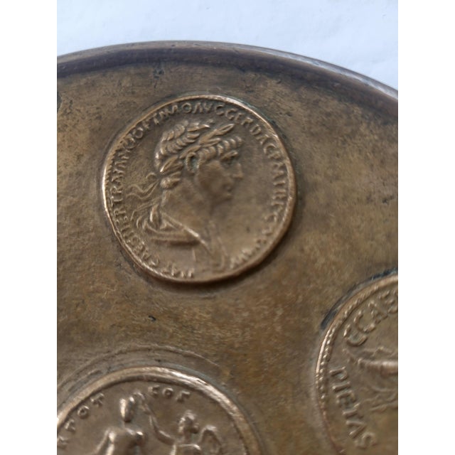 A highly charming late 19th-century Italian Grand Tour trinket dish, intricately sand-cast in sold brass. The round...