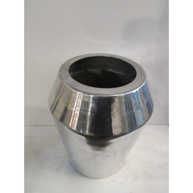 Unique industrial-style vase with an eye-catching surface and shape. WEAR Wear consistent with age and use. Industrial...