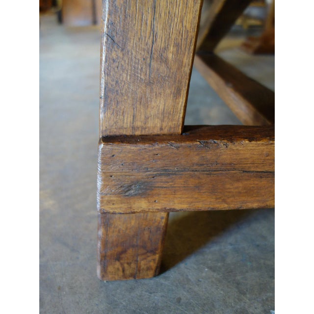 Bellini's Capretta bench style - a perfect seating companion for our table collection. Trestle style with carved cross...