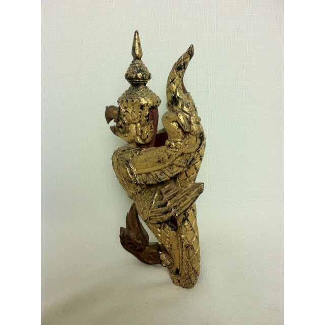 A Garuda is a legendary bird or bird-like creature in Hindu, Buddhist and Jain faith. He is shown either in zoomorphic...