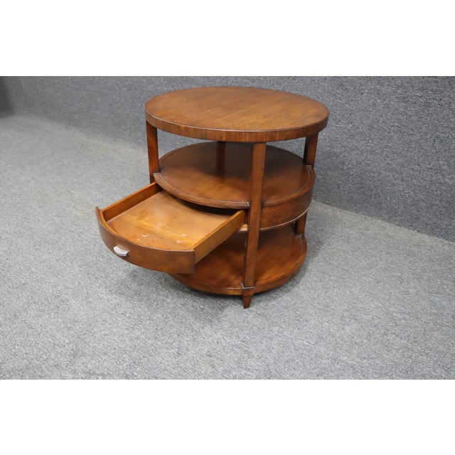Mahogany Art Deco style drum table with drawer.
