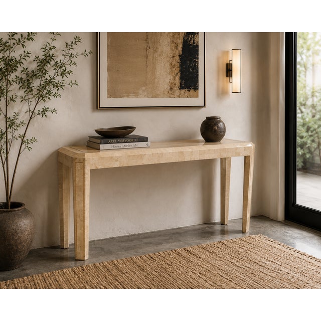 This elegant console table is a beautiful example of the refined craftsmanship associated with Maitland-Smith, known for...