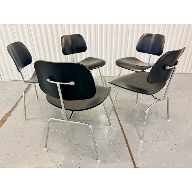 Black DCM Dining Chairs by Charles & Ray Eames for Vitra, 2005, Set of 5. All five chairs are strong and stable....