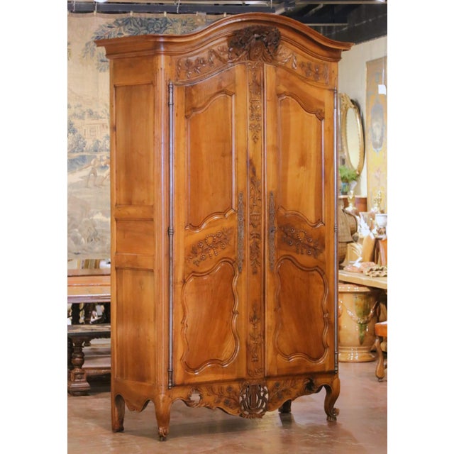 This exceptional antique “Armoire Provençale” was crafted in southern France circa 1760. Built of richly figured walnut,...