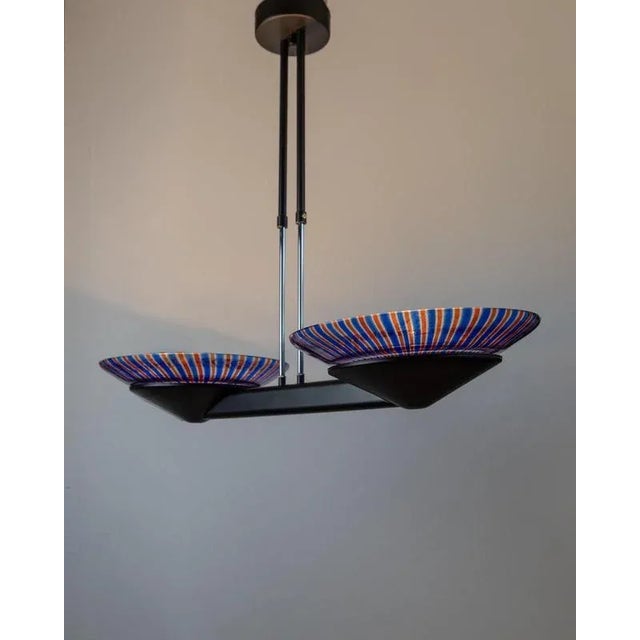 This xxl vintage murano glass chandelier from the 1980s is a bold statement piece in true style. Featuring a minimal black...