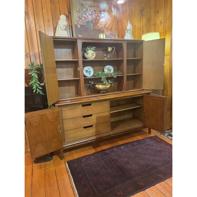 Mid-Century Modern Walnut Chinoiserie Two-piece China Cabinet, Featuring Asian-Style Brass Hardware. Solid Structure....