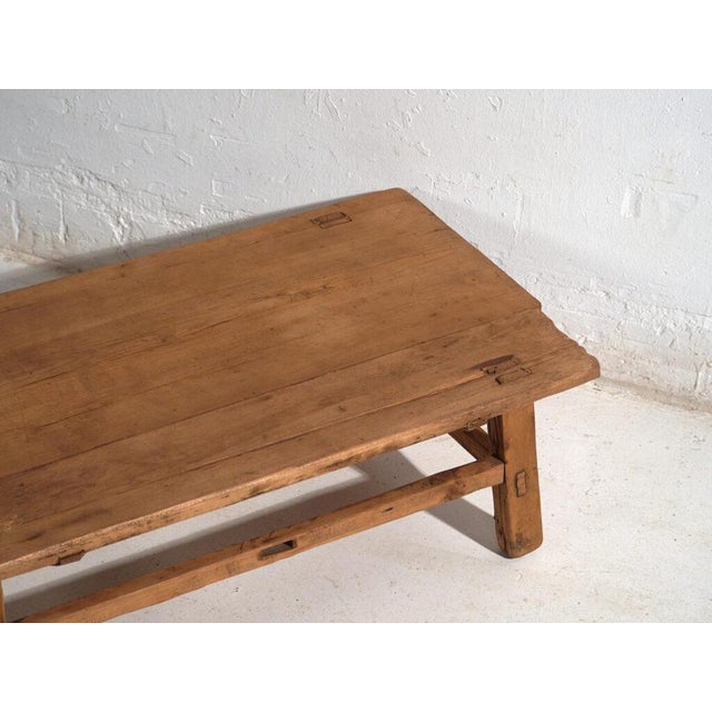 Antique low table in pine wood, traditional chinese furniture originating from northern china and dated circa 1930....