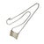 A rectangular sterling silver pendant by M&J Savitt is set off by applied 14-karat yellow gold triangles that run along...
