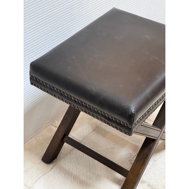 Design Plus Gallery presents the Elyse Ottoman in Durango Smoke from Four Hands. The ottoman features a soft, top-grain...