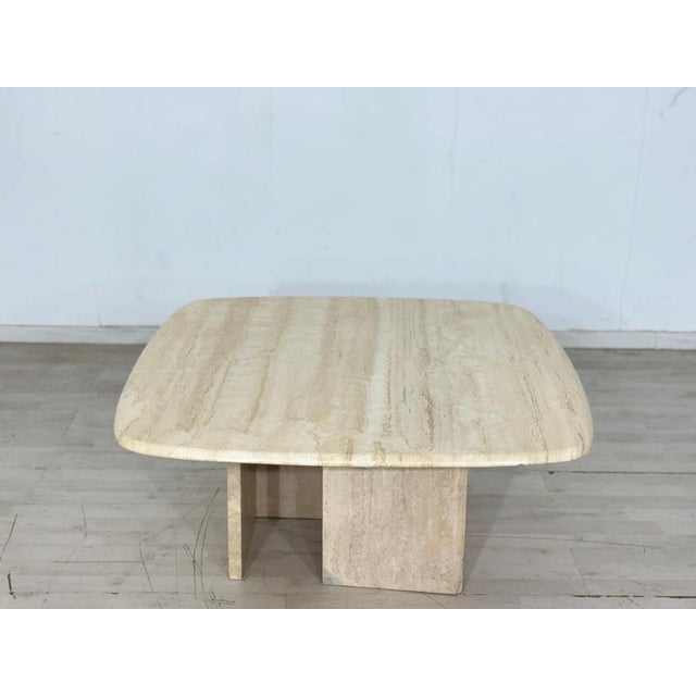 For sale is a stylish vintage coffee table from the 1970s. The table impresses with its high-quality craftsmanship and...