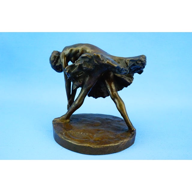 Measurements: height: 12 cm; width: 13.5 cm; depth: 11 cm; weight: 1.869 kg item : a fine solid bronze sculpture titled...