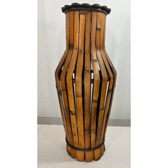 Welcome to Turtle and Crane! Allow us to Present to you this Vintage Late 20th Century Boho Chic Split Bamboo Floor Vase...