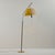 Metal floor lamp in the style of J. T. Kalmar from the 1950s. The floor lamp has a plastic lampshade and its height is...