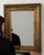 This mirror carries genuine presence, its gold gilt frame, rectangular immediately setting the tone for the piece. The...