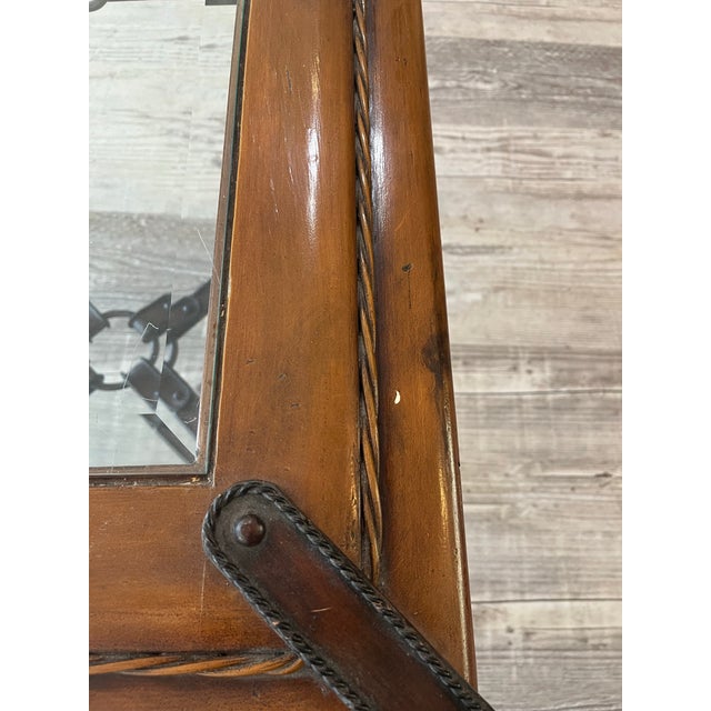 Bring a touch of timeless equestrian sophistication to your living space with this Jacques Adnet Hermès style accent...